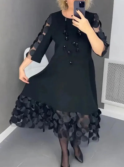 Della | Flared dress with polka dot decoration