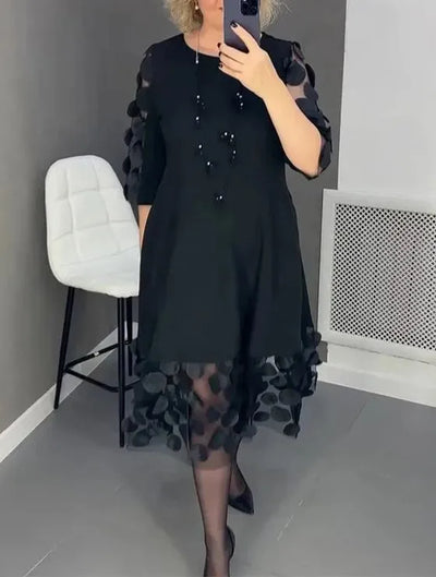 Della | Flared dress with polka dot decoration