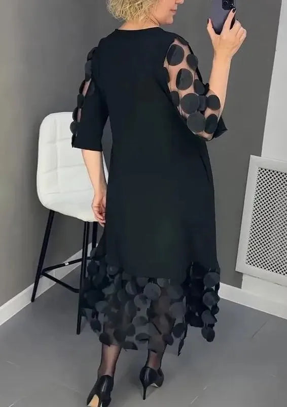 Della | Flared dress with polka dot decoration
